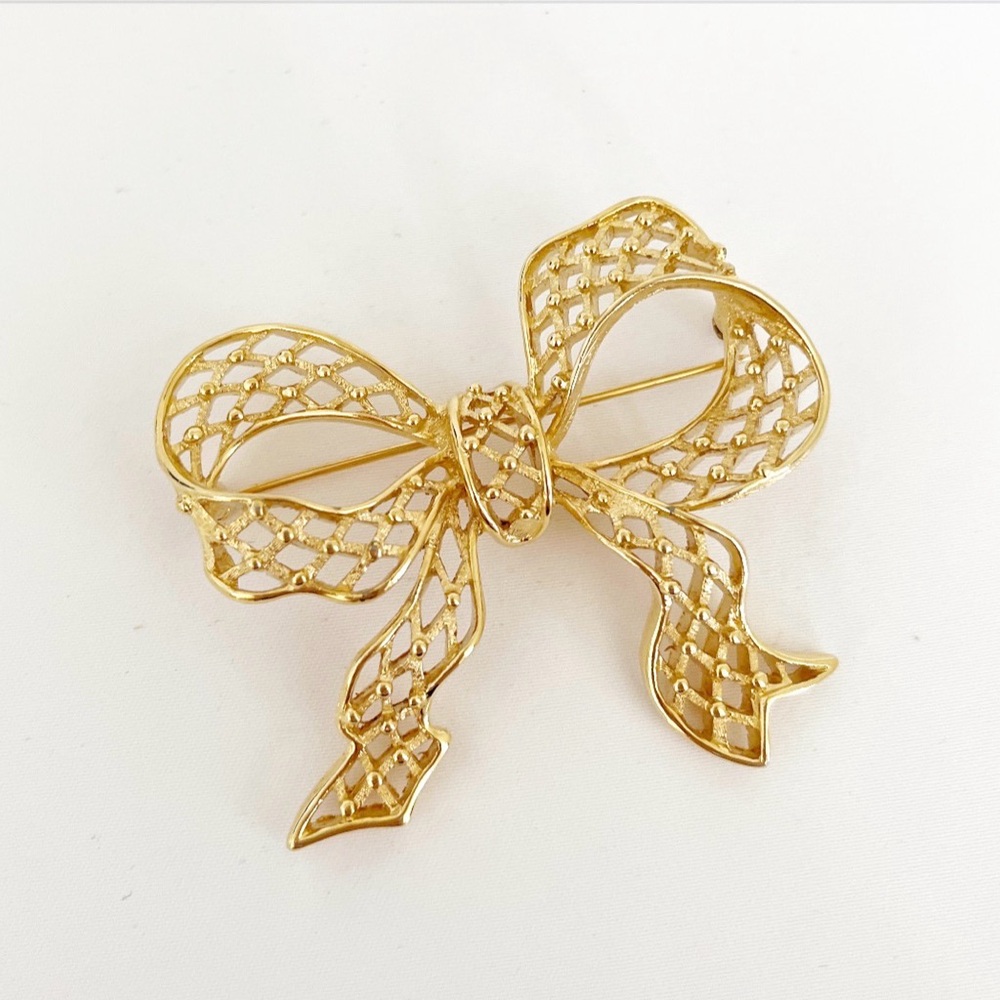 MONET Bow Brooch Vintage Lapel Pin Gold Tone Filigree
